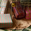Simple linen tree skirt under tree with presents