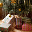 Christmas tree with gifts and ornaments.