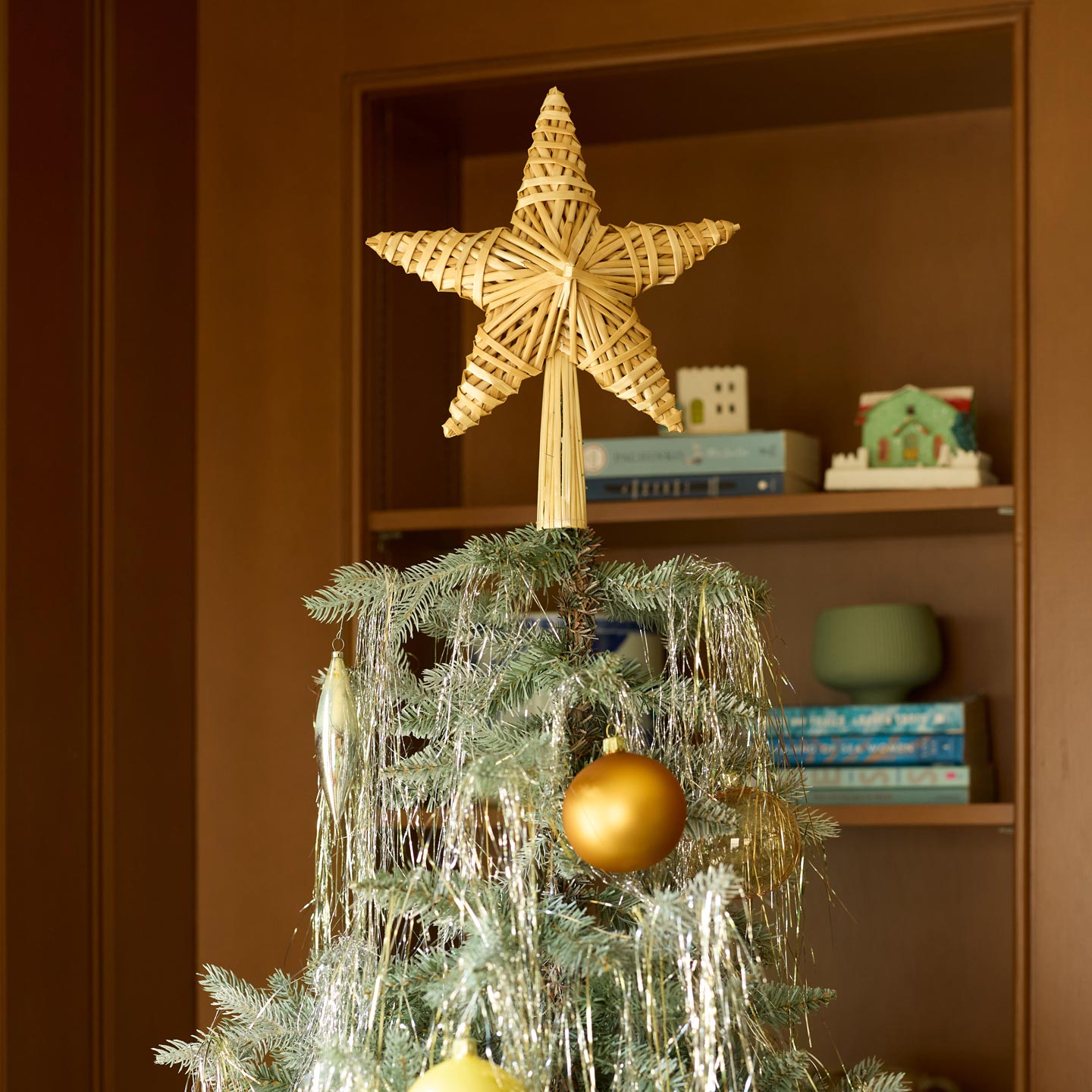 Natural tree topper on tree
