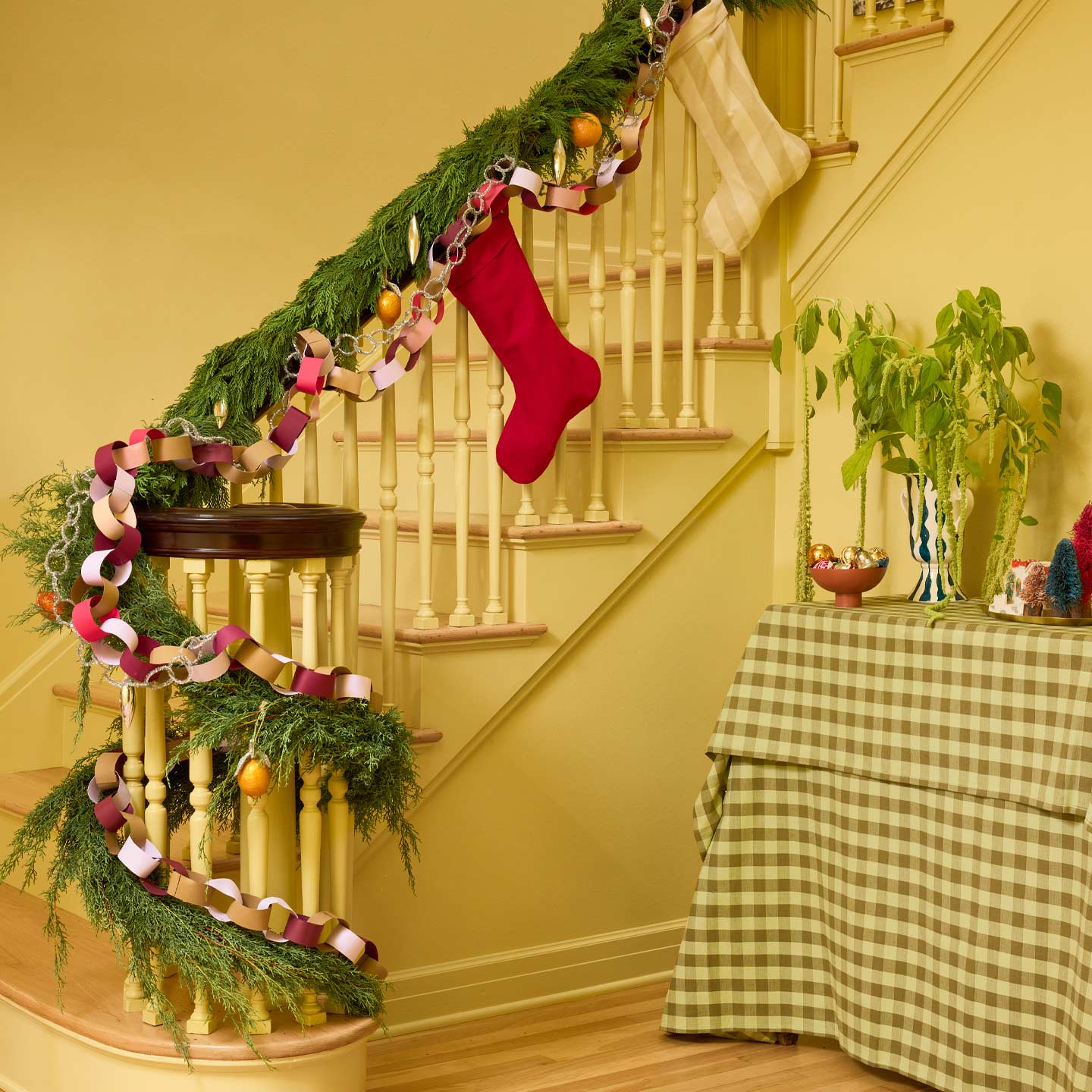Stairway with garland and stockings.
