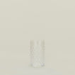 Textured clear glass tumbler.