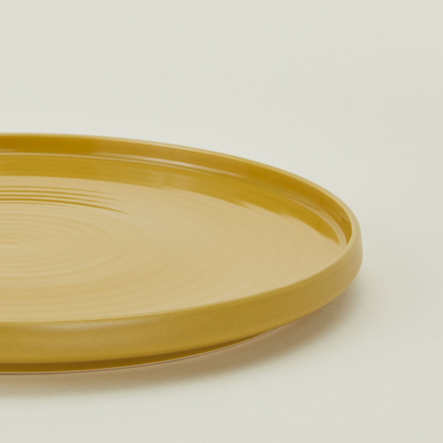 Close up of Essential Salad Plate in Mustard.