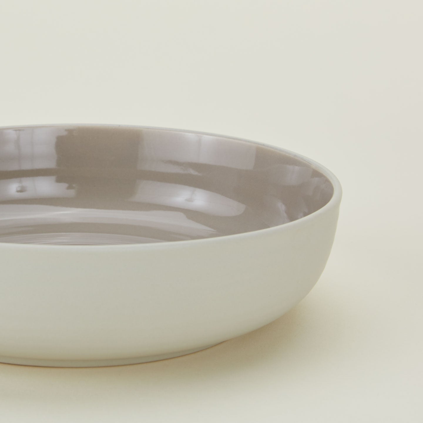 Close up of Essential Low Bowl in Light Grey.