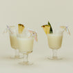 Iridescent cocktail umbrellas in drinks