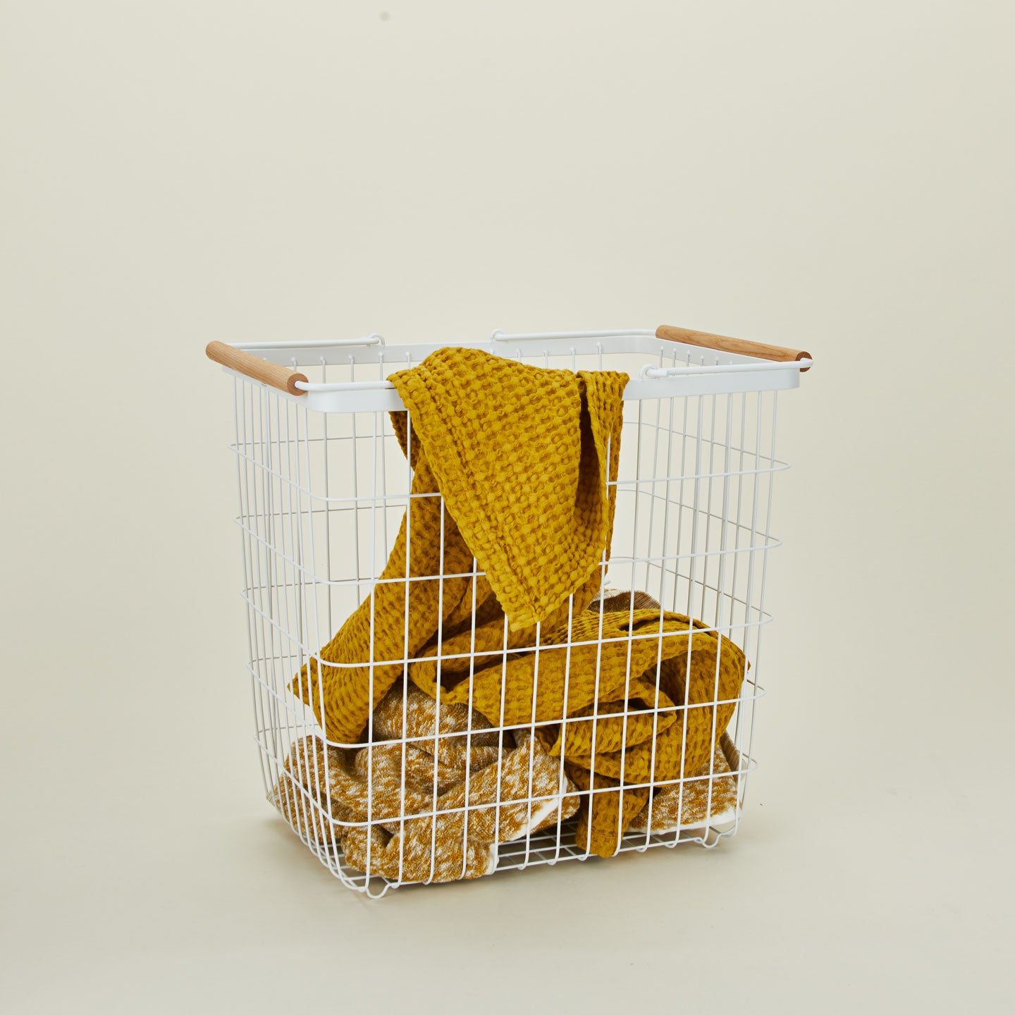 A modern steel laundry basket. 