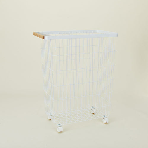 A  modern slim rolling laundry basket.