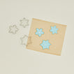 Snowflake cookie cutter set with cookies