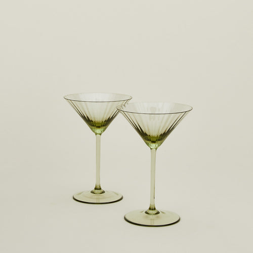Set of two ribbed olive martini glasses.
