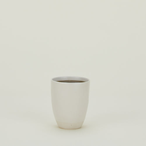 Atelier Mug, filled with coffee.