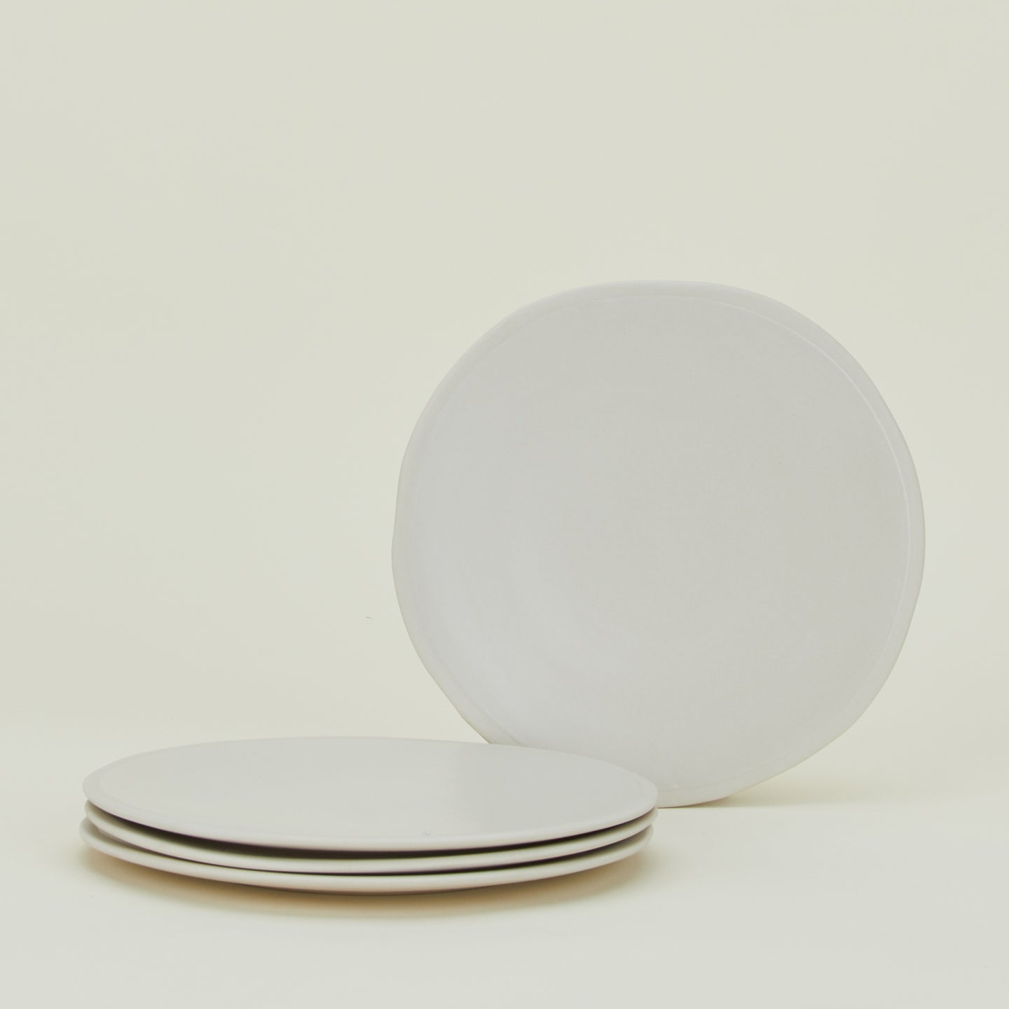 Four Atelier Salad Plates.