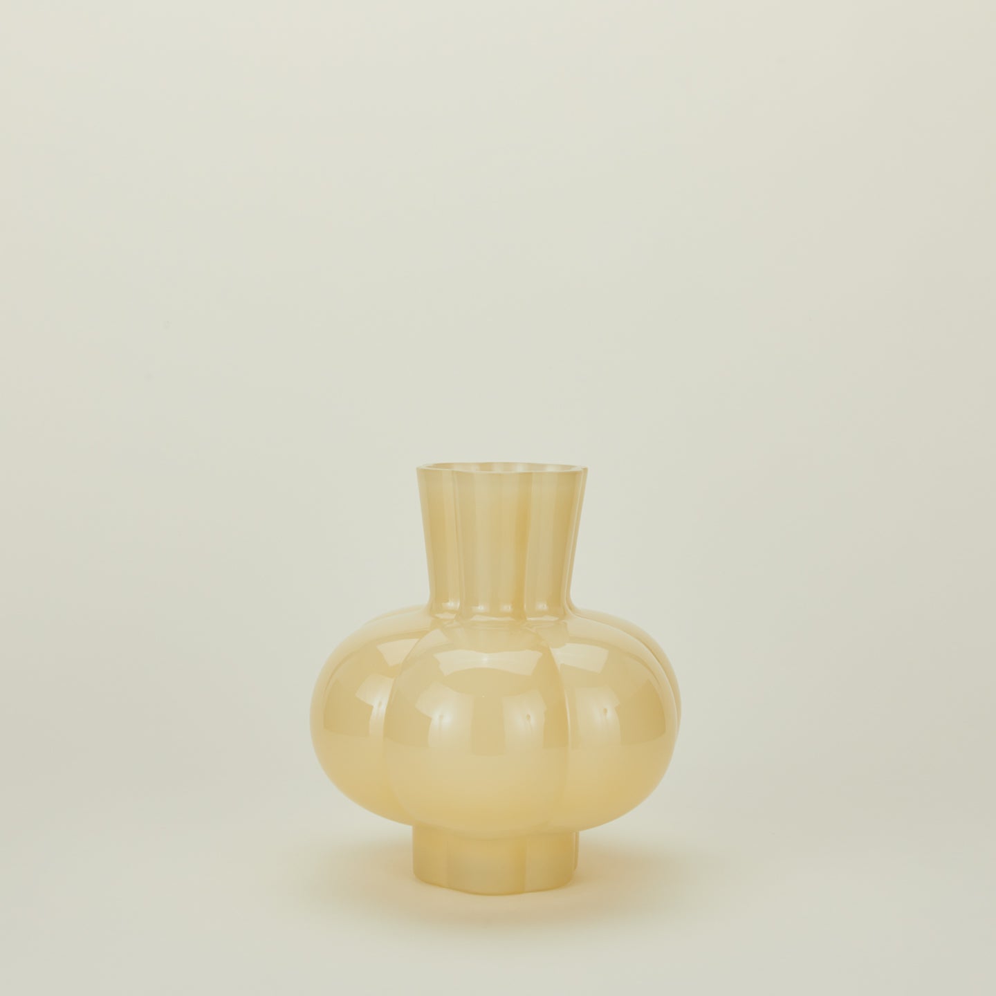 Opaque yellow glass pleated vase