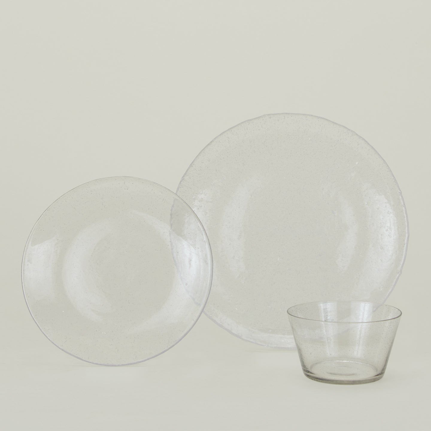 Group of Clear glass dinner plate, dinner plate and bowl.