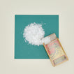 Faux snow on turquoise paper