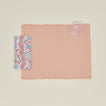 Place setting with block printed floral napkin in blush.