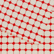 Close up view of Dove and Donkey wicker fringed placemat in cherry