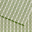 Close up view of Dove and Donkey hopsack placemat in leaf