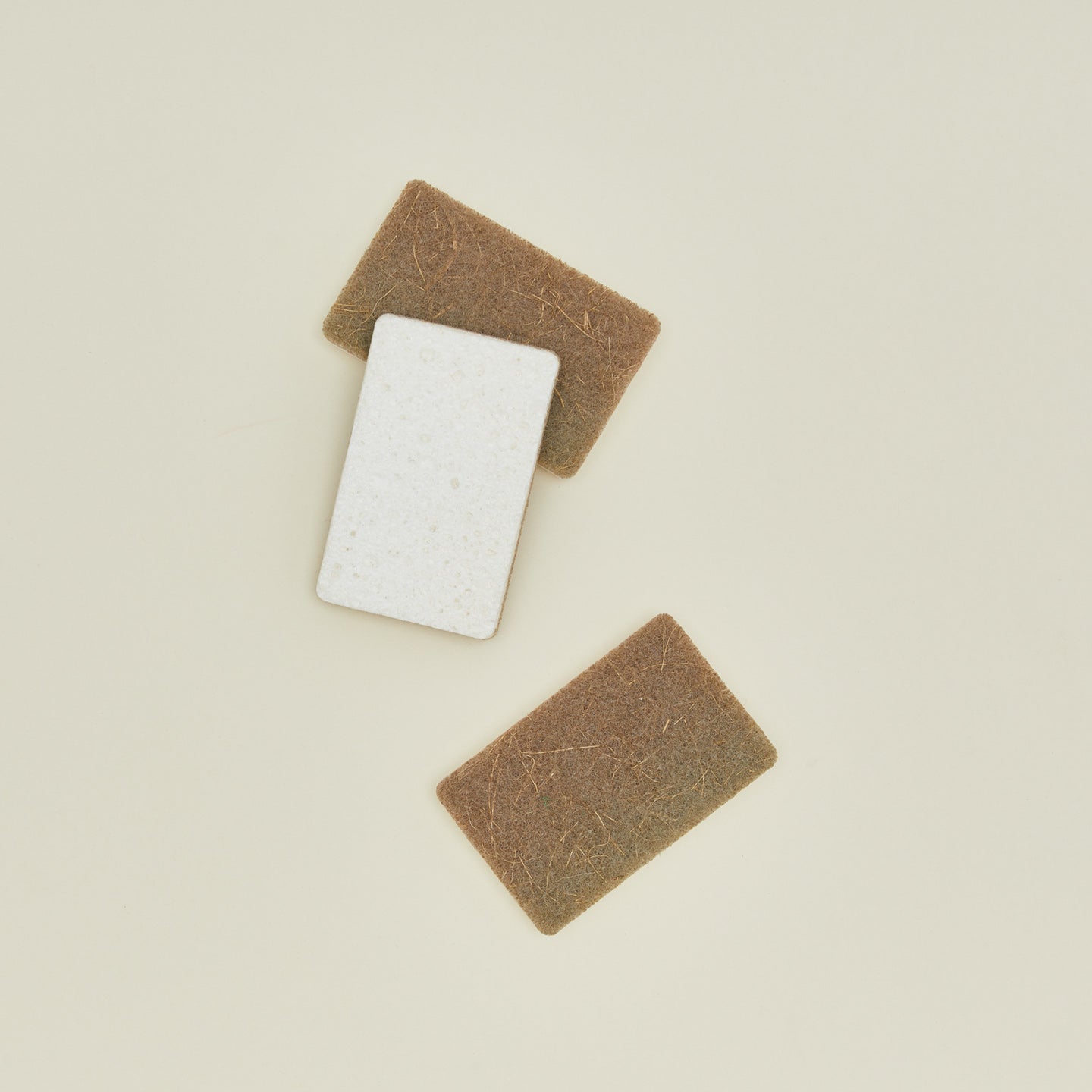 Overhead view of Ecofreax Cellulose walnut sponge, set of 3