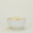 Essential Serving Bowl in Bone with popcorn.