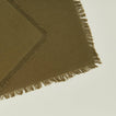 Close up view of essential cocktail napkin in olive