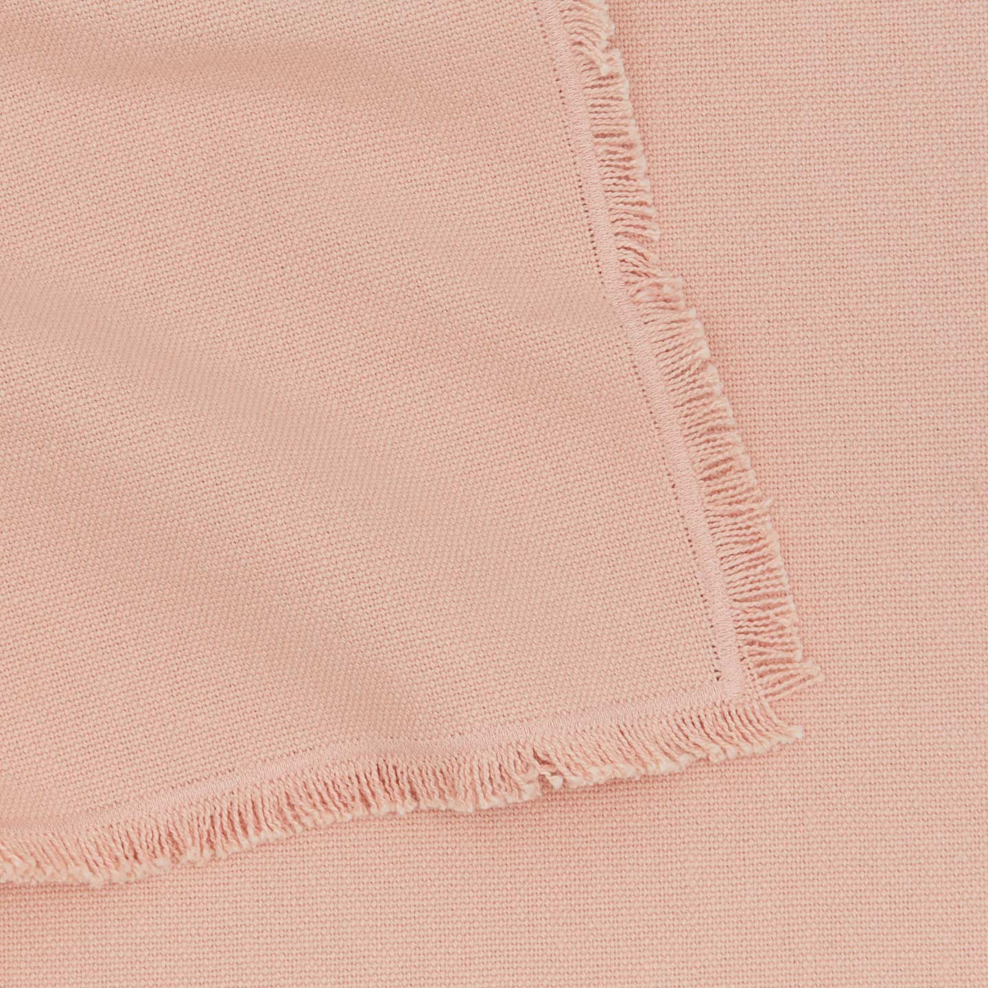 Close up view of essential cotton placemat in blush