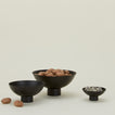 Essential footed bowl family in black