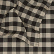 Close up view of Essential Gingham tablecloth in black/grey