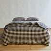 Essential Gingham Duvet - Light Grey/Black on bed with matching pillow cases