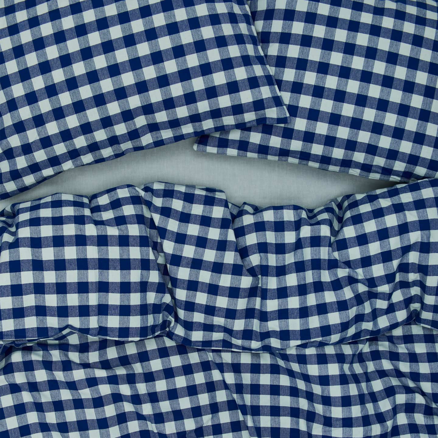 Essential Gingham Duvet - Sky/Blue on bed with matching pillow cases