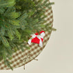 Overhead view of Essential GIngham Tree Skirt - Olive/Sage with tree