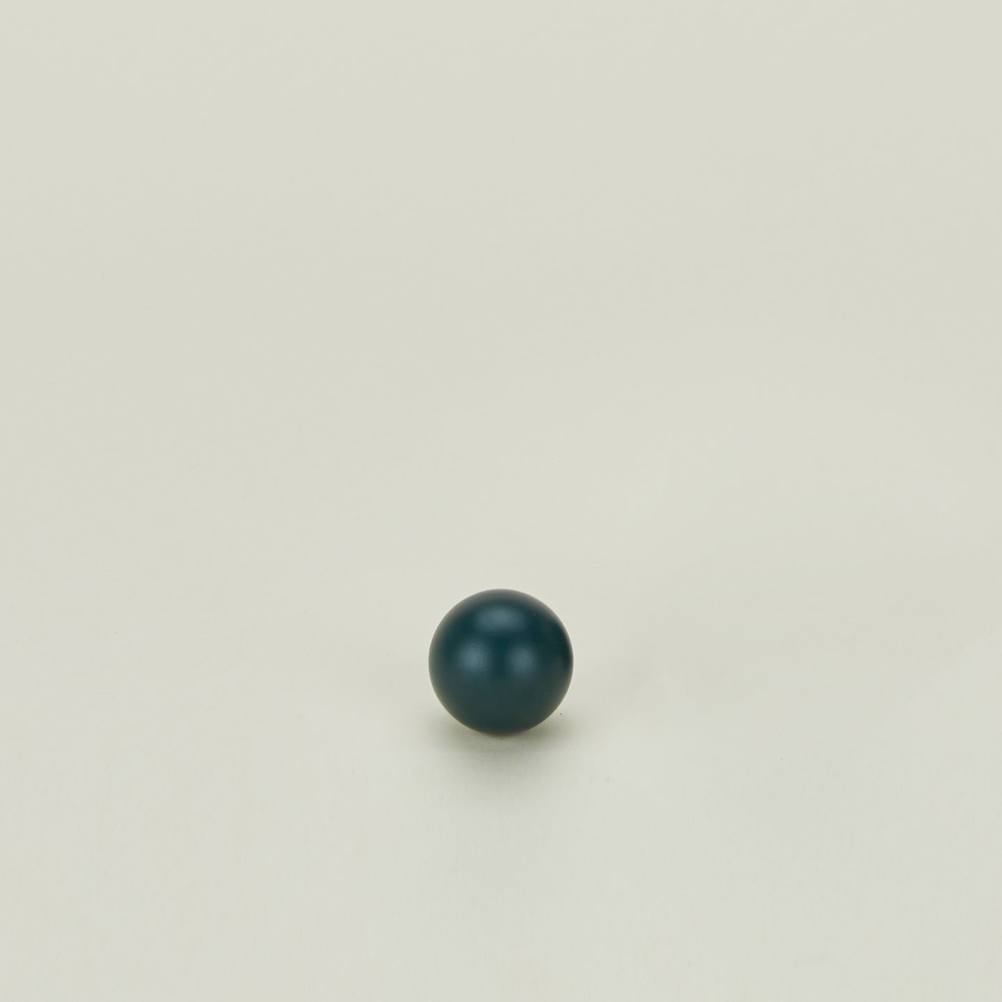 Small sphere knob in Dark Peacock.