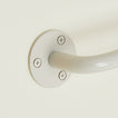 Close up of towel bar in Ivory.