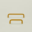 Small and large drawer pulls in Mustard.