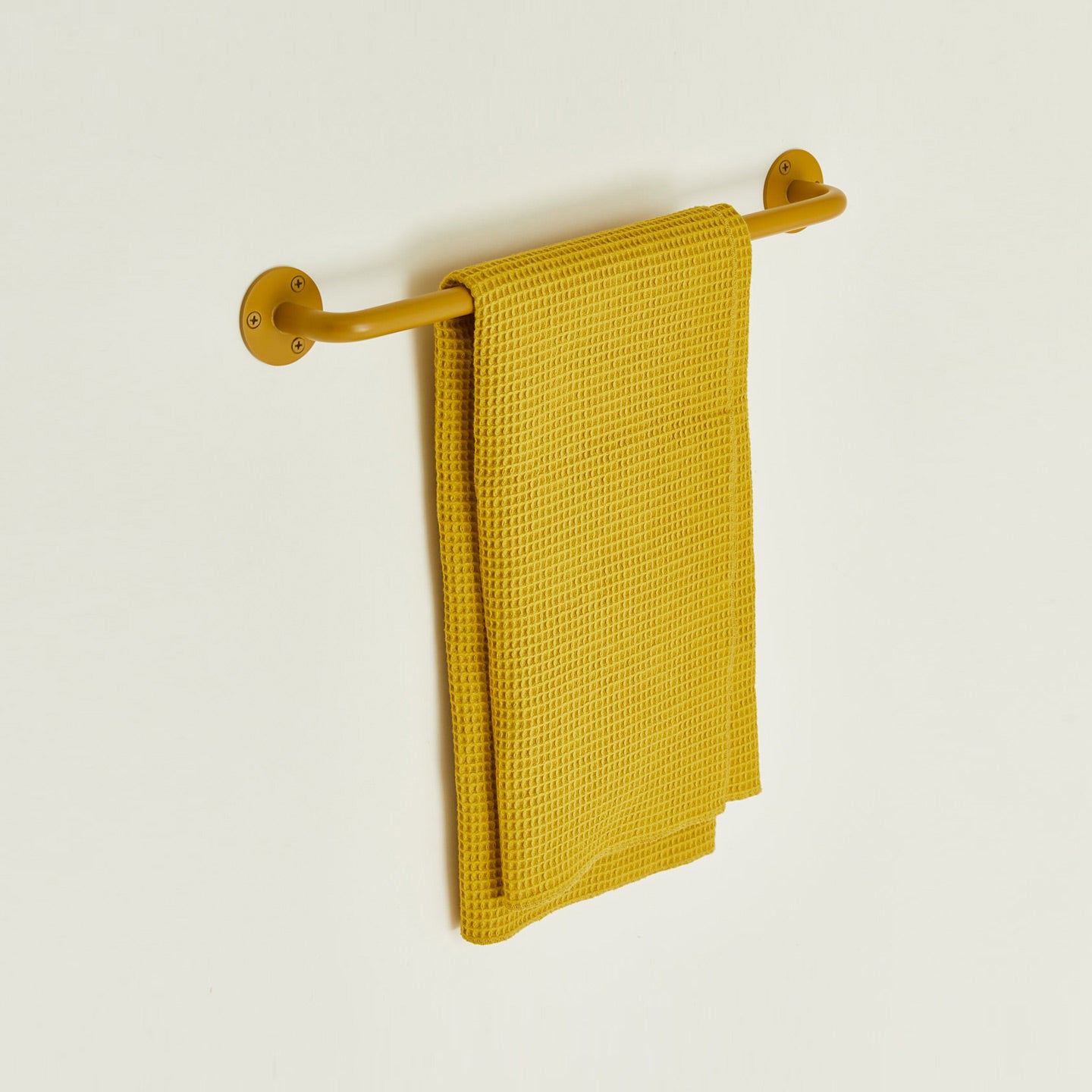 Small towel bar in Mustard with waffle dish towel.