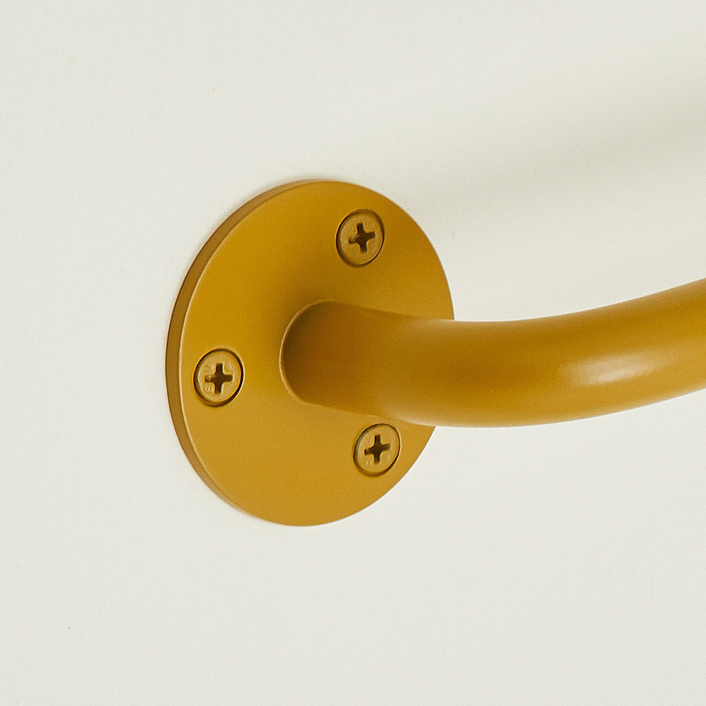 Close up of towel bar in Mustard.