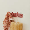 Essential hook rack in terracotta washcloth and sponge