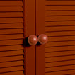 Large terracotta essential sphere knobs on louvered doors