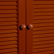 Small terracotta essential sphere knobs on louvered doors