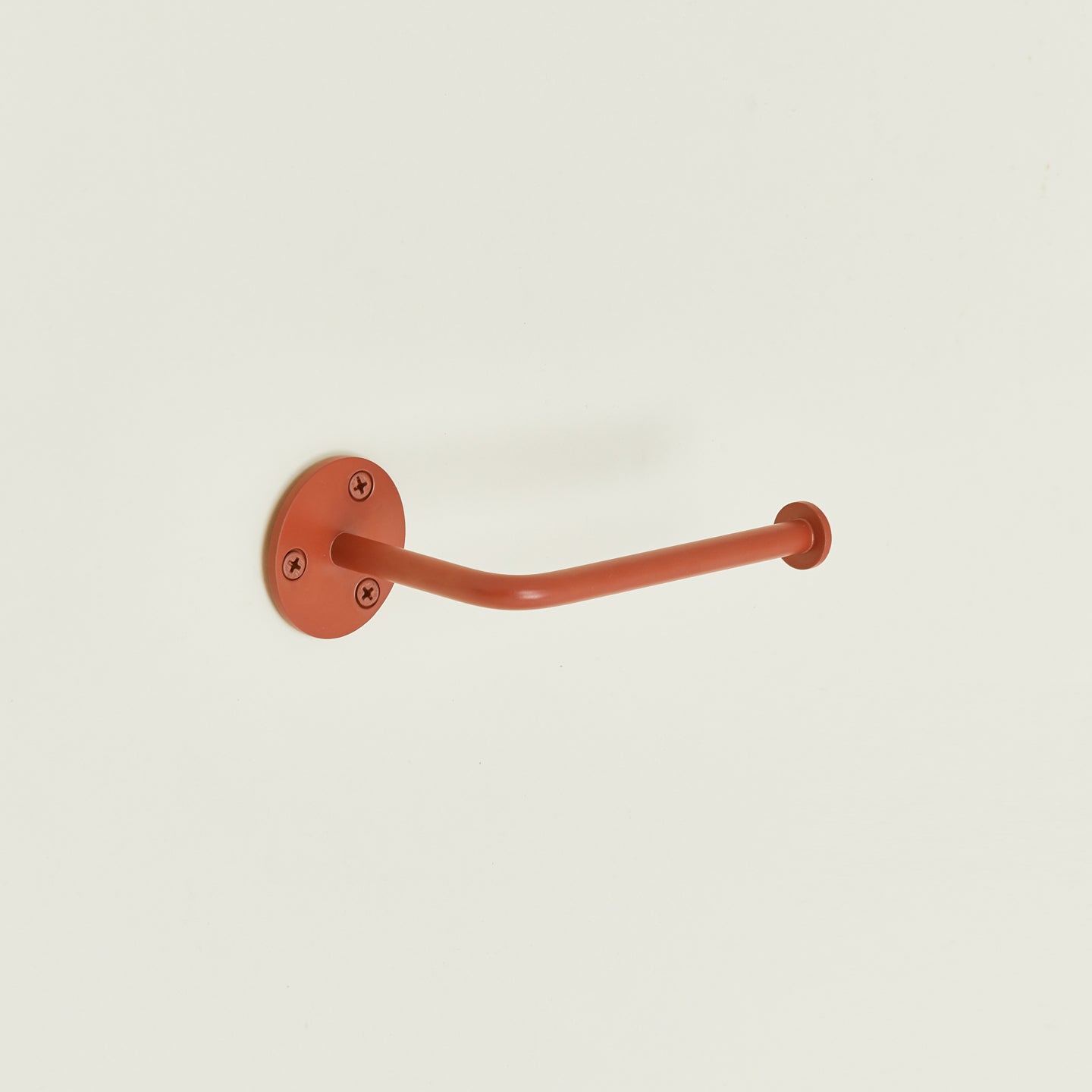 Toilet paper holder in Terracotta.