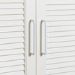 Large essential drawer pulls in white on cabinet
