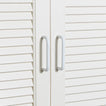 Small essential drawer pull in white on cabinets