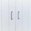 Small essential drawer pull in white on cabinet