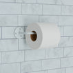 Essential toilet paper holder in white on tile background.