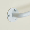 Close up view of essential towel bar in white