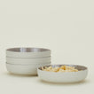 Four Essential Low Bowls in Light Grey, with tortilla chips.