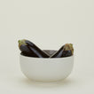 Essential Serving Bowl in Light Grey with eggplant.