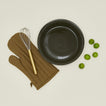 Essential pie dish in olive with spatula, limes and oven mit