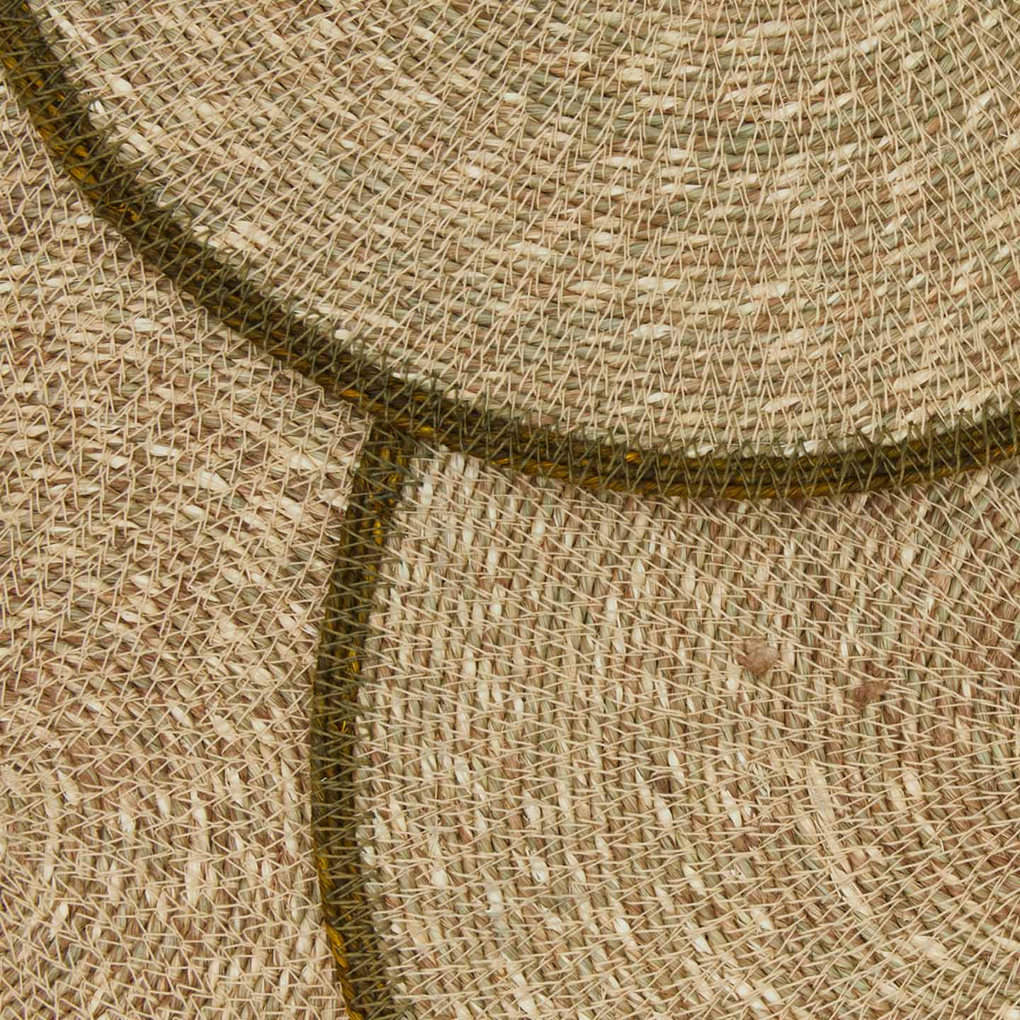 Close up view of essential woven placemats 