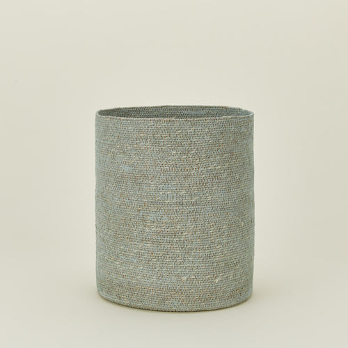 Essential woven wastebasket in sky