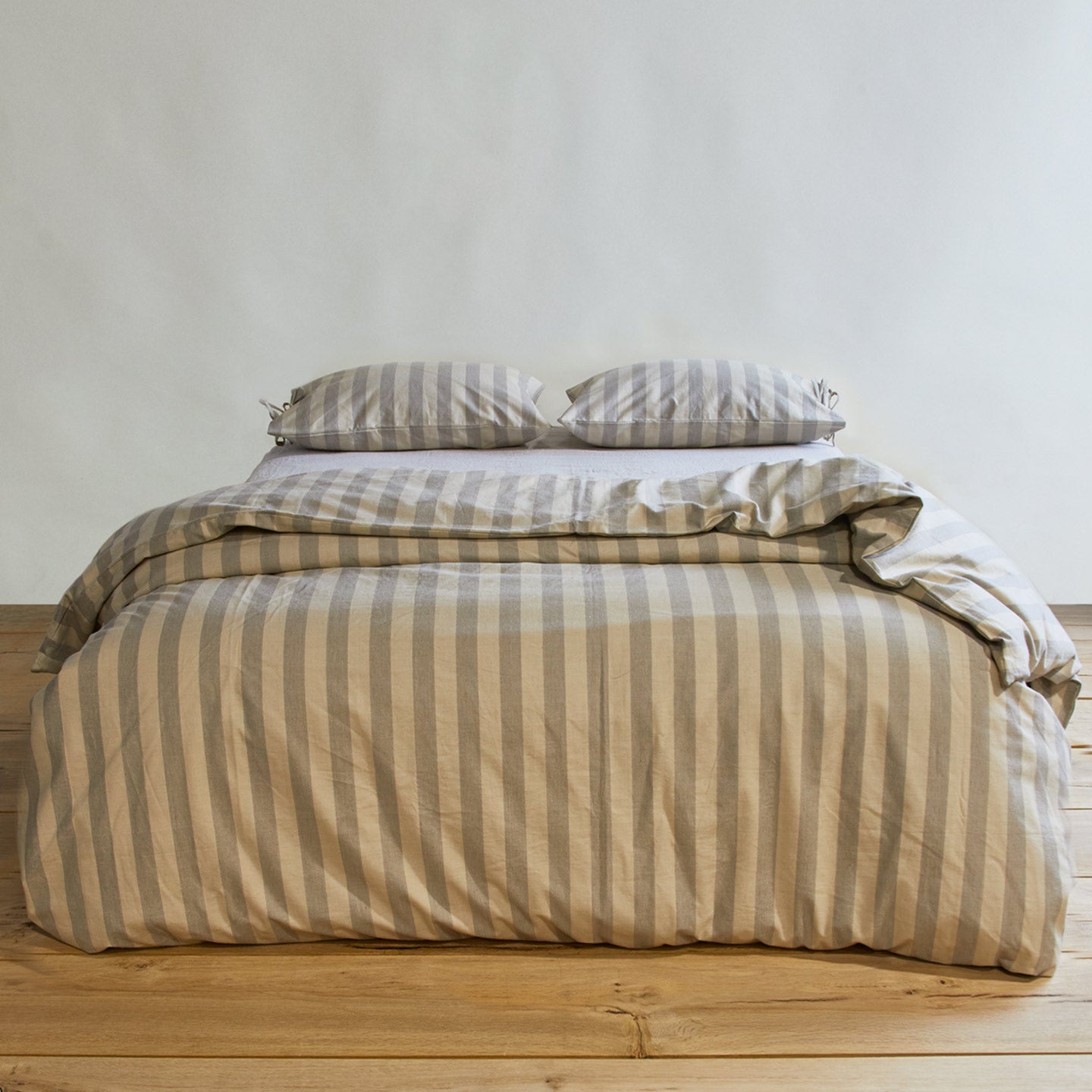 Essential Stripe Duvet - Light Grey/Dark Grey on bed with matching pillowcases