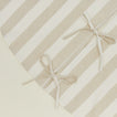 Detailed view of Essential Striped Tree Skirt - Ivory/Flax